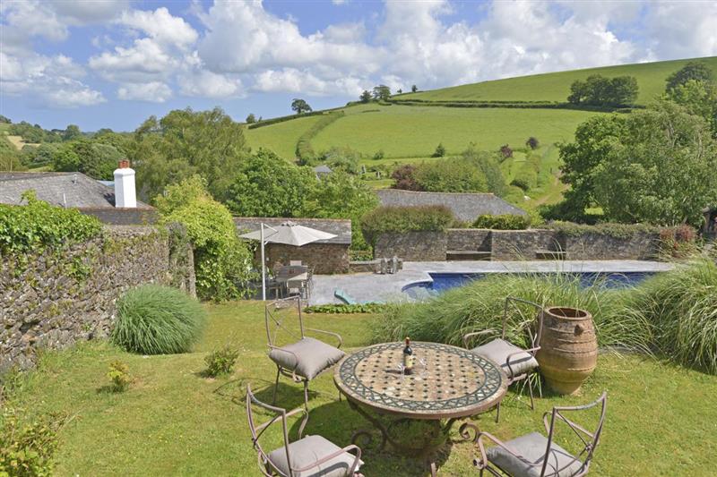 Garden with seating - and that pool! at Yetson House, Totnes, Devon