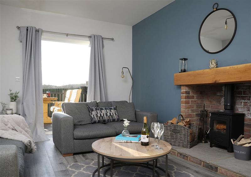Relax in the living area at Yew Cottage, Lucker near Warenford
