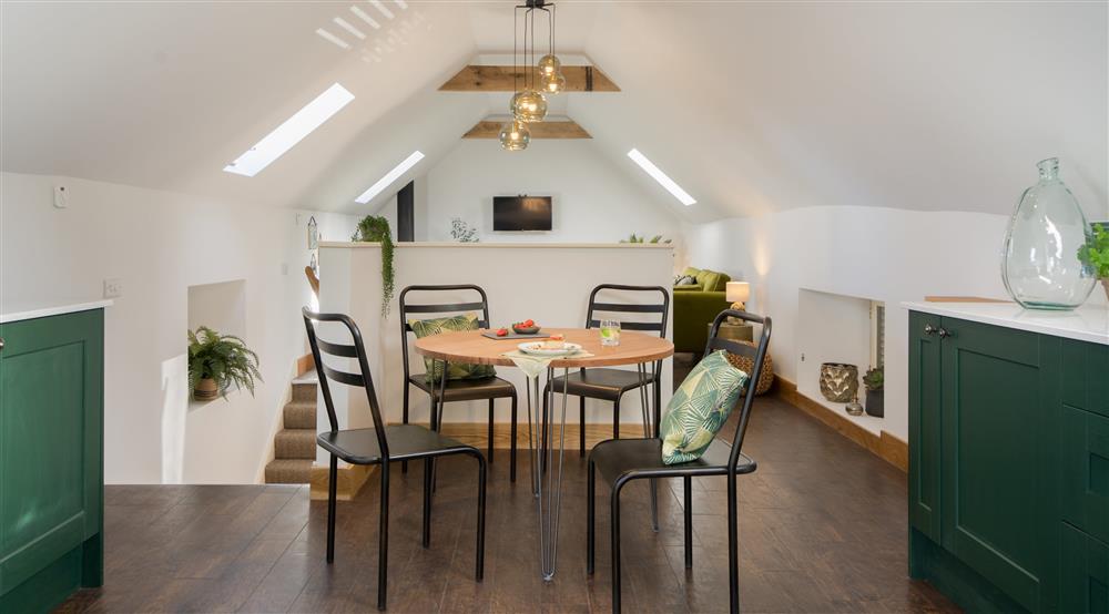 The open plan kitchen and dining room at Yew Tree Barn in Dorking, Surrey