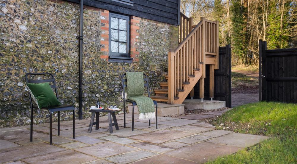 The outdoor seating area at Yew Tree Barn in Dorking, Surrey