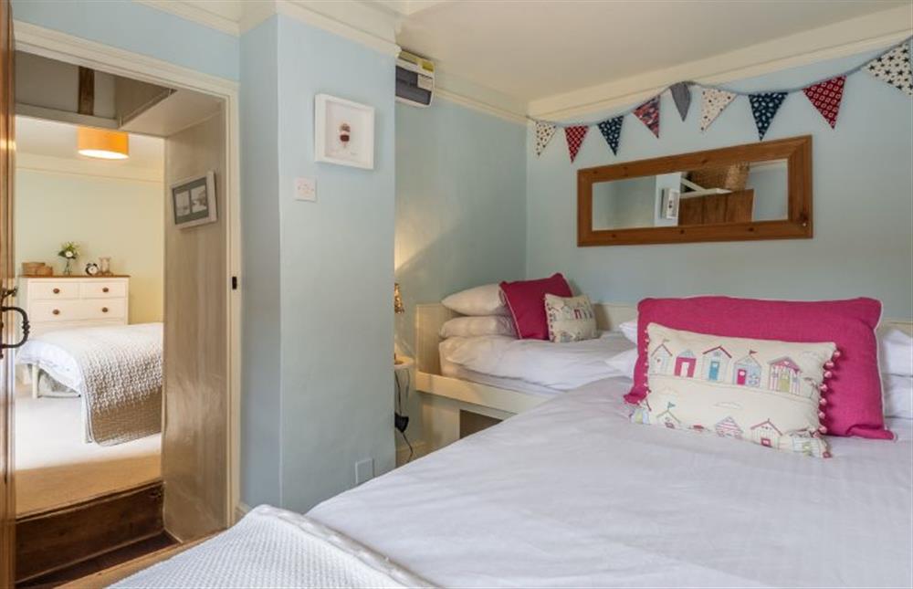 First floor:  Twin bedroom looking towards master bedroom at Yew Tree Cottage, Blakeney near Holt