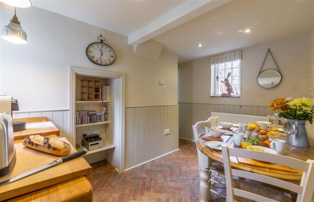 Ground floor:  Dining room with table and seating for four at Yew Tree Cottage, Blakeney near Holt