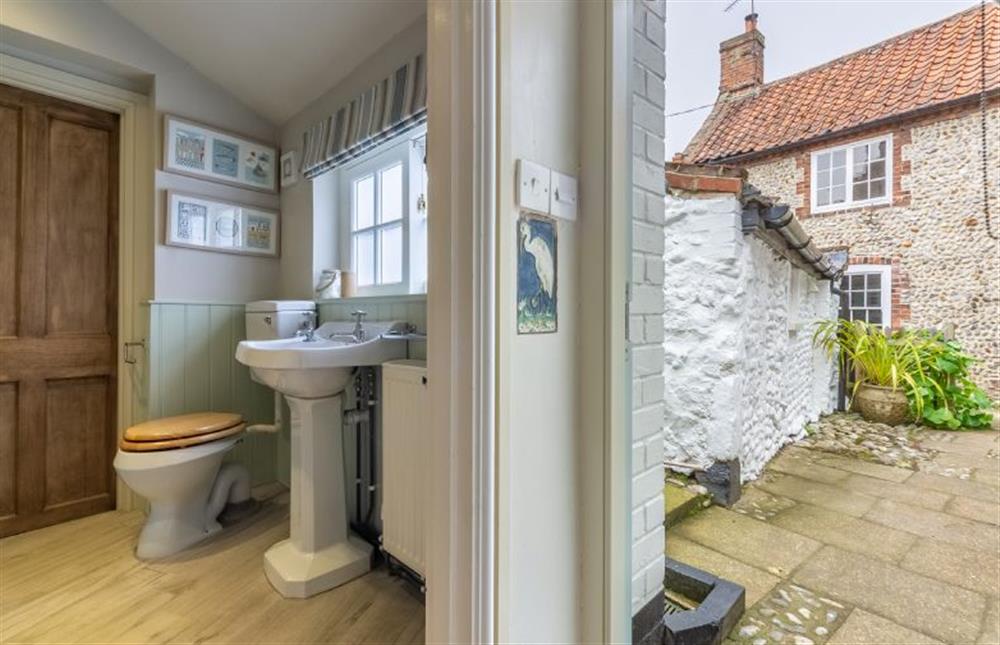 Ground floor:  Door to bathroom and outside at Yew Tree Cottage, Blakeney near Holt