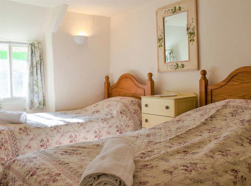 Twin bedroom at Yew Tree Cottage in Branscombe, Devon