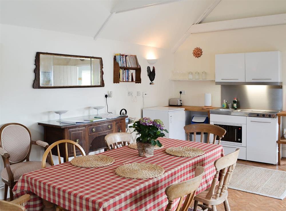 Farmhouse kitchen style dining area at Yew Tree Cottage in Cheriton, near Alresford, Hampshire