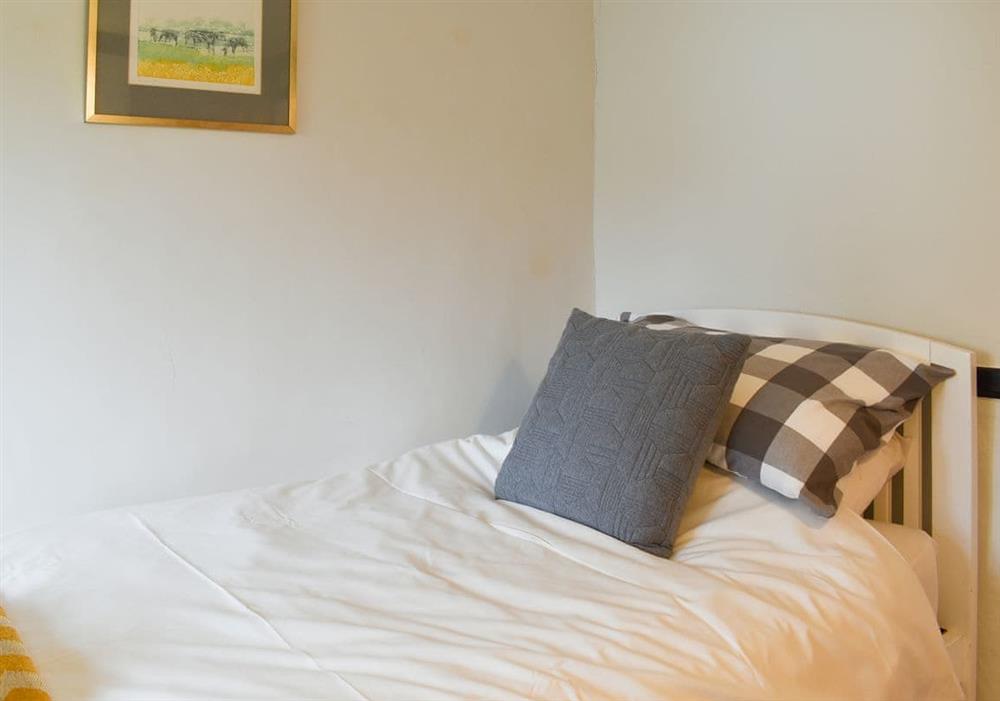 Homely bedroom with single bed at Yew Tree Cottage in Farnham, near Blandford Forum, Dorset