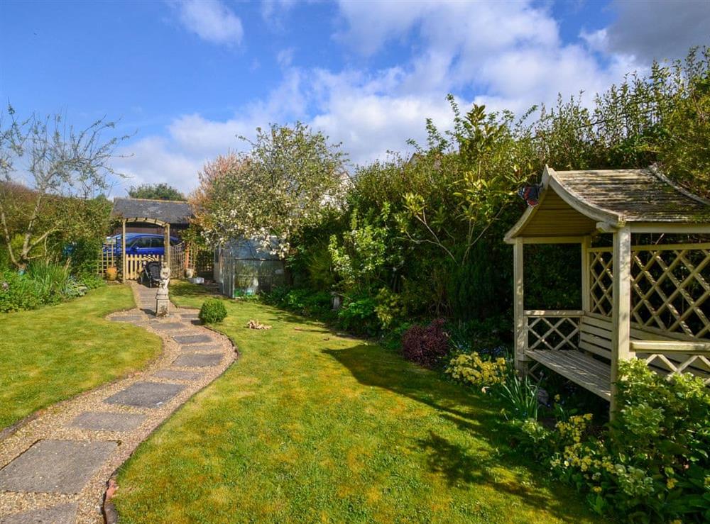 Large, relaxing garden at Yew Tree Cottage in Farnham, near Blandford Forum, Dorset