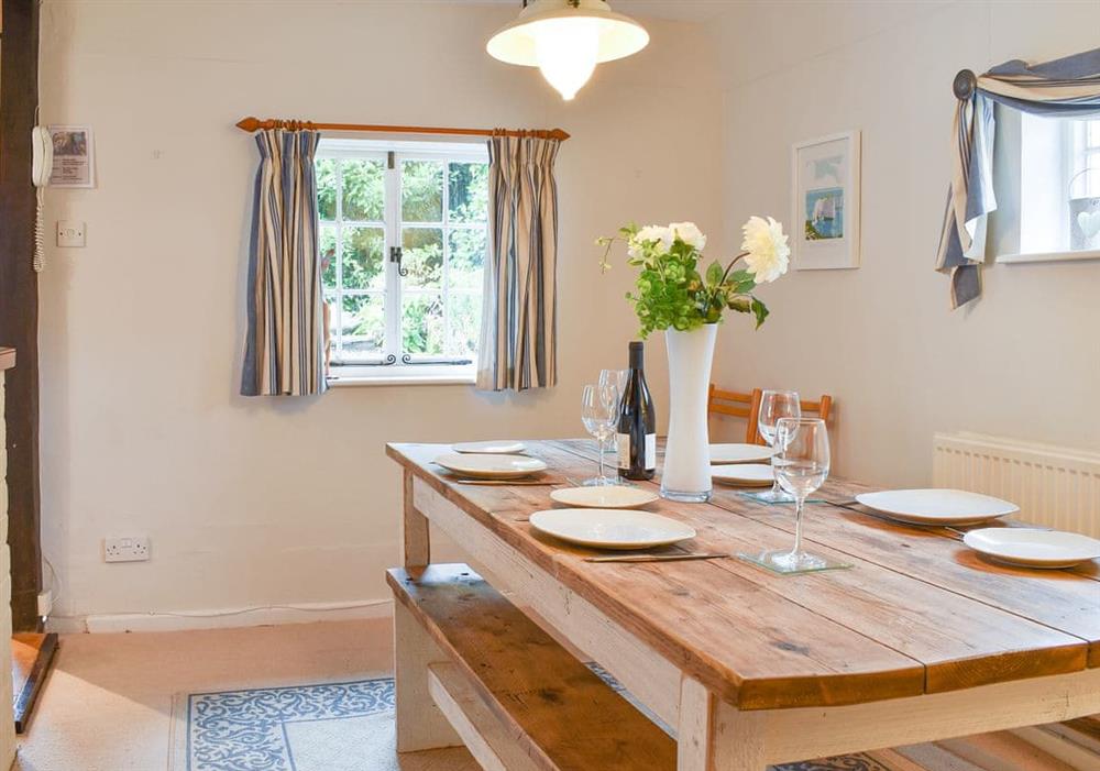 Light and airy dining area at Yew Tree Cottage in Farnham, near Blandford Forum, Dorset