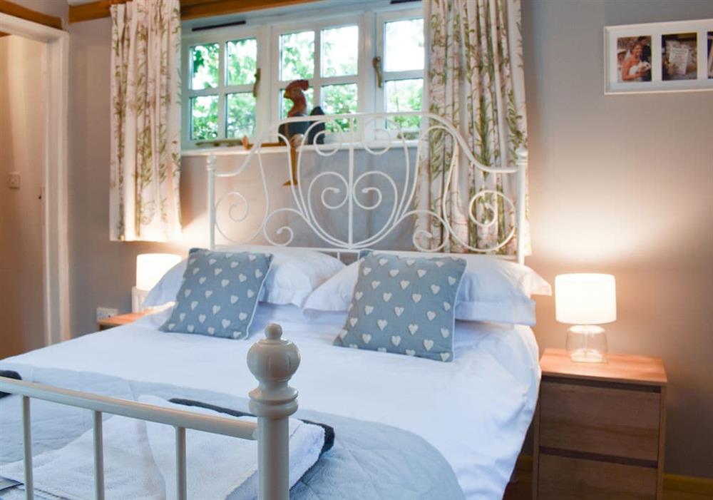 Welcoming bedroom at Yew Tree Cottage in Farnham, near Blandford Forum, Dorset