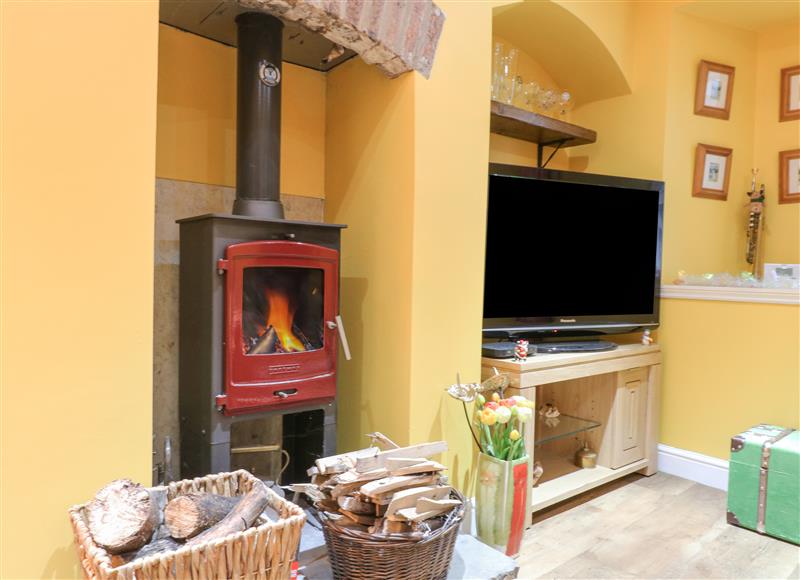 Relax in the living area at Yew Tree Cottage, Holymoorside near Chesterfield