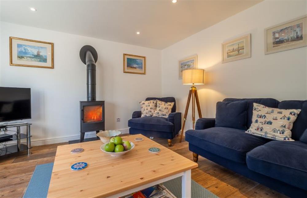 Sitting room with seating for all four guests at Yew Tree Cottage, Westleton