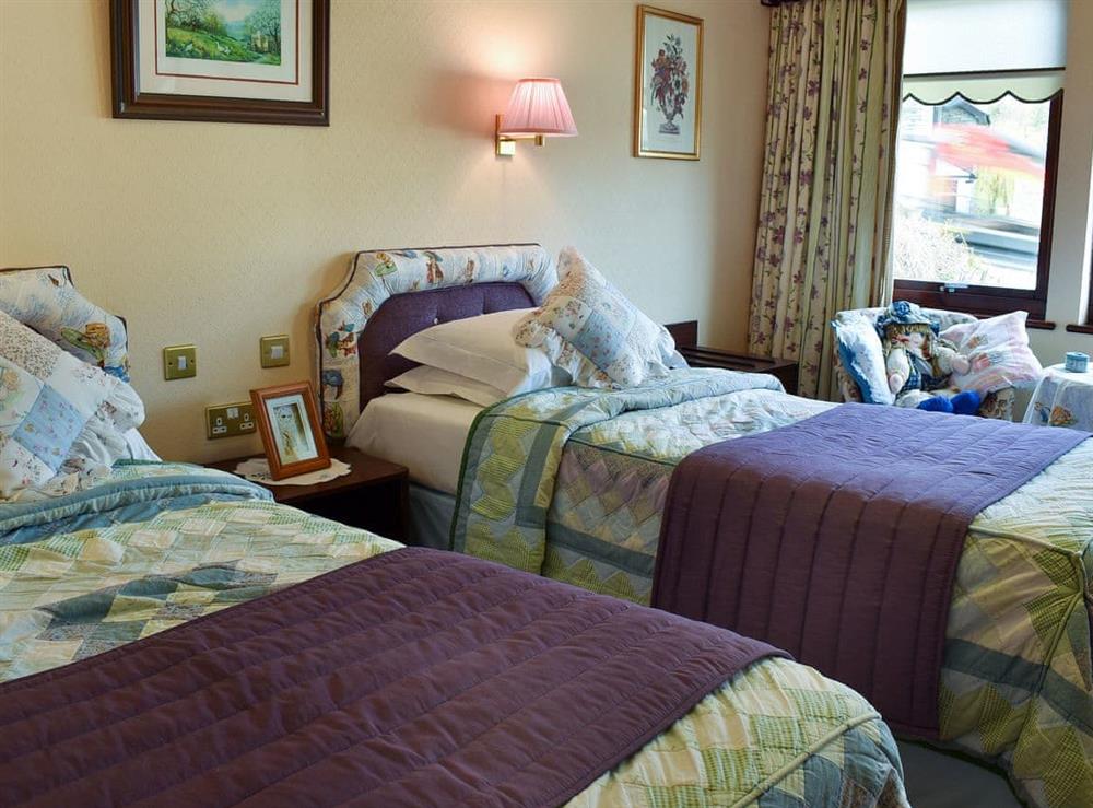 Cosy twin bedroom at Yewdale Crags Apartment in Coniston, Cumbria
