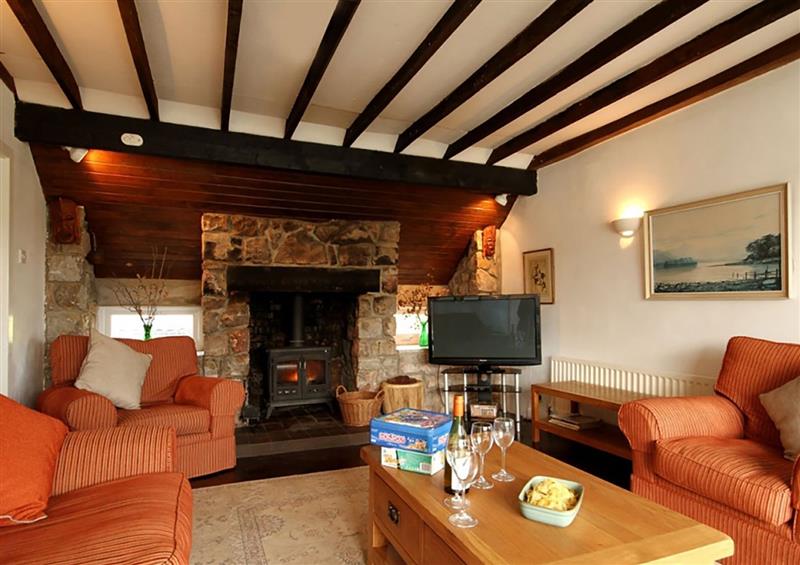 Relax in the living area (photo 2) at Ynys Castell, Menai Bridge