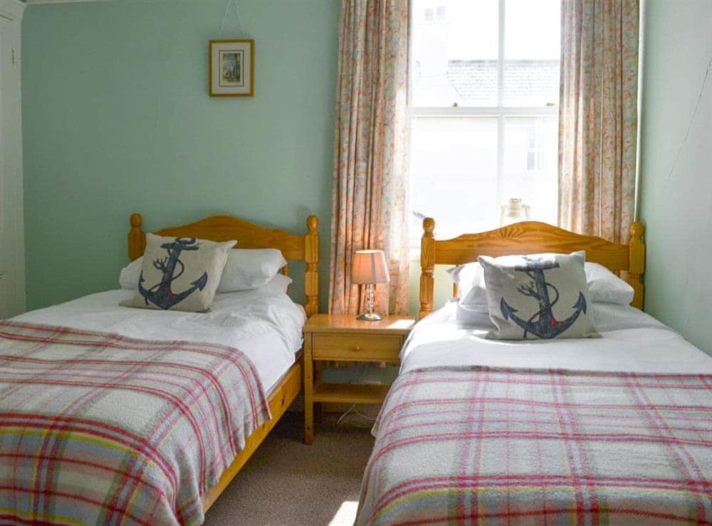 Cosy twin bedroom at Ynys Groes in Rhosneigr, Gwynedd