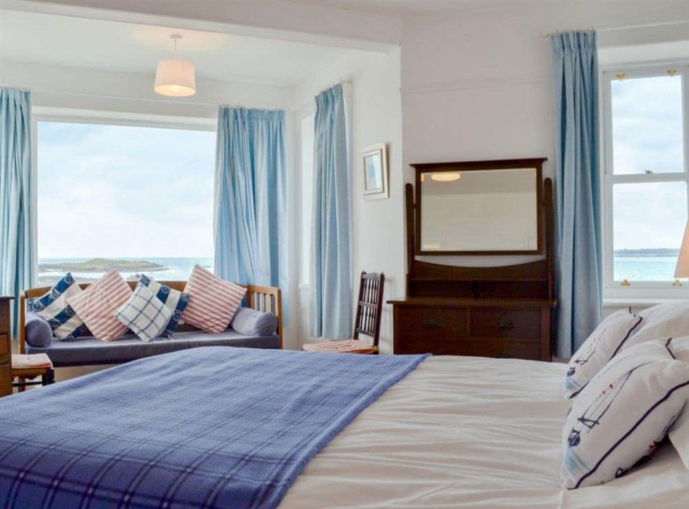 Wonderful master bedroom with sea views at Ynys Groes in Rhosneigr, Gwynedd