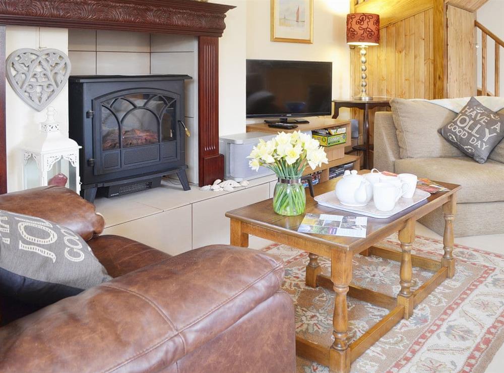 Comfortable furnishings make afternoon tea in front of the fire a pleasure