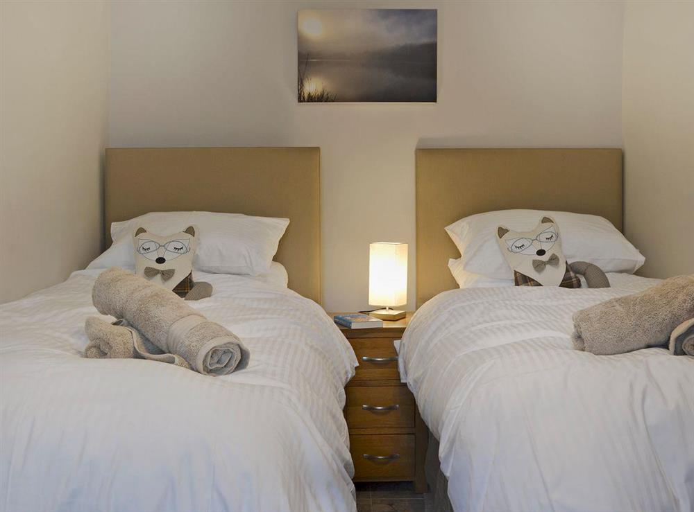 Charming twin bedroom at The Cottage,