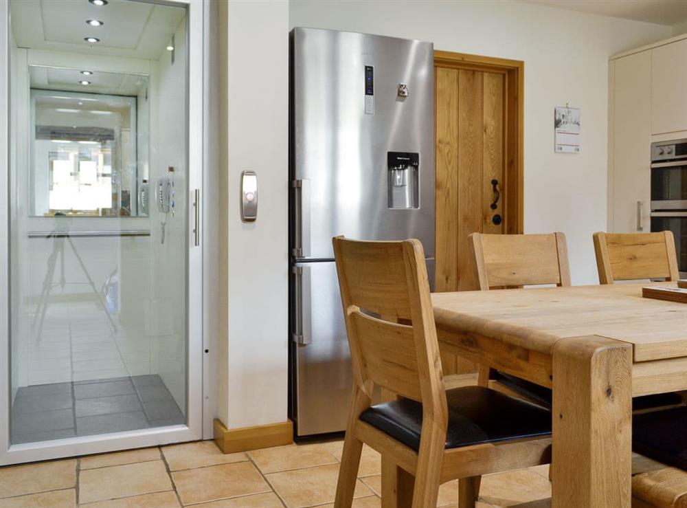 Kitchen/diner with lift to first floor at Ysgubor in Pwllglas, near Ruthin, Denbighshire