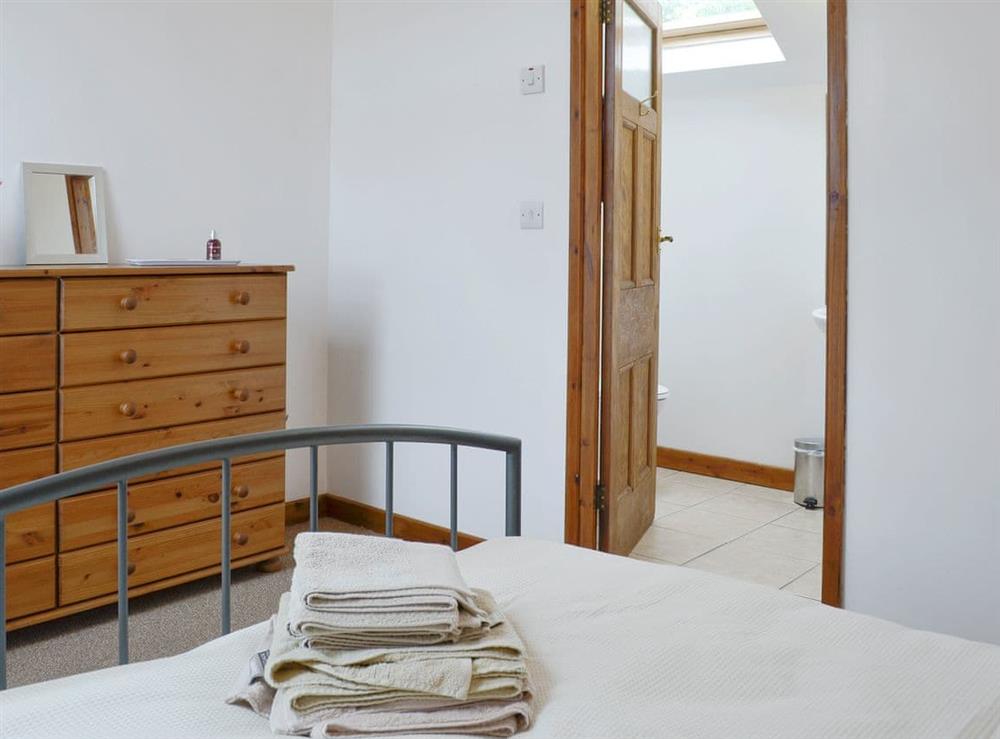 Peaceful double bedroom with en-suite shower room at Ysgubor in Tregarth, near Bangor, Gwynedd