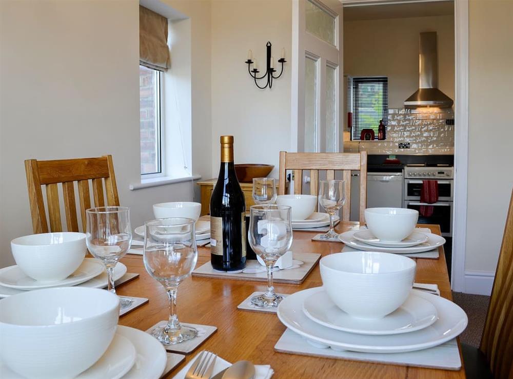 Lovely dining room and adjacent kitchen at Zonnebloem in Brymbo, near Wrexham, Clwyd