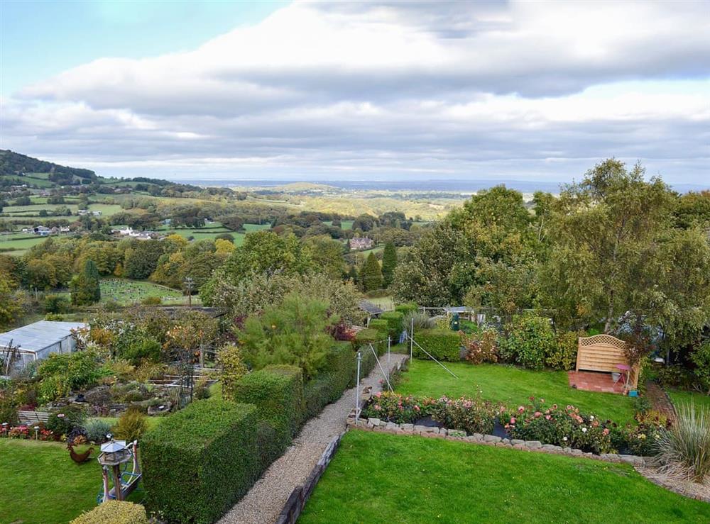 Mainly lawned garden with far reaching views (photo 2) at Zonnebloem in Brymbo, near Wrexham, Clwyd