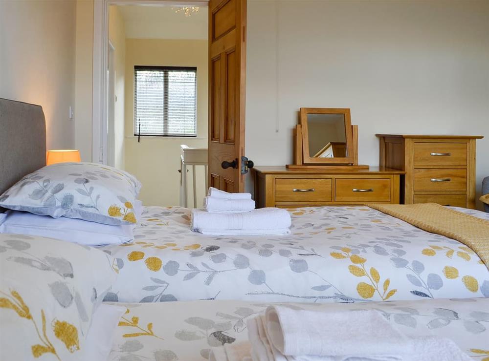 Pretty twin bedroom at Zonnebloem in Brymbo, near Wrexham, Clwyd